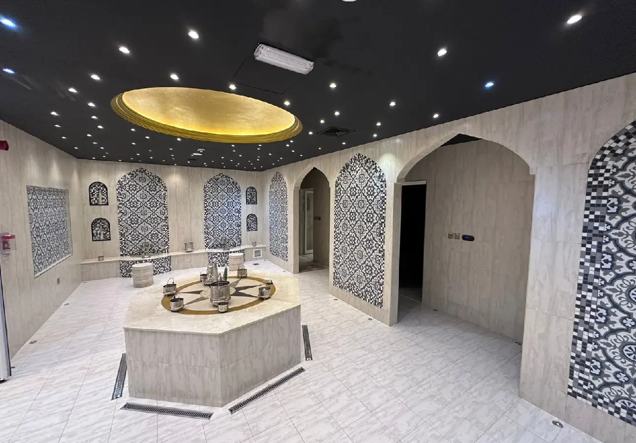 Luxury Hammam interior with traditional Moroccan decor and natural products at Monarch Beauty Salon Dubai