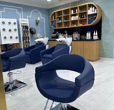 Professional hair styling and cutting services at Monarch Beauty Salon Dubai